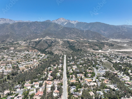Aerial view of wealthy Alta Loma community and mountain range, Rancho Cucamonga, California, United States photo