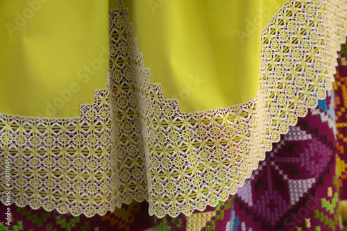 Traditional Canary Islands costume details - skirts with open work embroidery insets