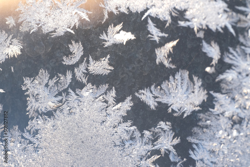 magical, fabulous,frozen noisy window in cold winter, ice texture,frozen water on the window, frost, ice pattern, no focus