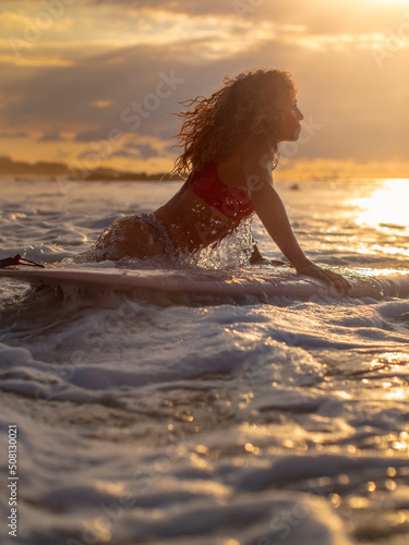 Photography Surfer Woman jumping into the waves