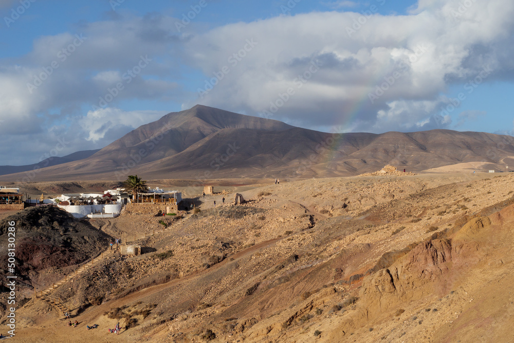 Desert landscape with rainbow on Lanzarote island