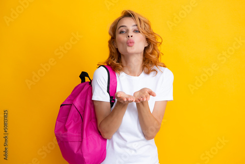 Portrait of happy woman holding backpack. Woman tourist backpacker.