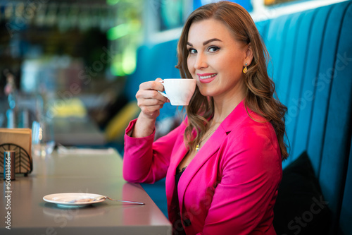Beautiful woman having a coffee in a cafe