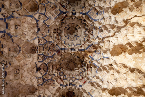 Ornamental ceiling and walls in Nasrid Palaces in the Alhambra palace Granada, Andalusia, Spain