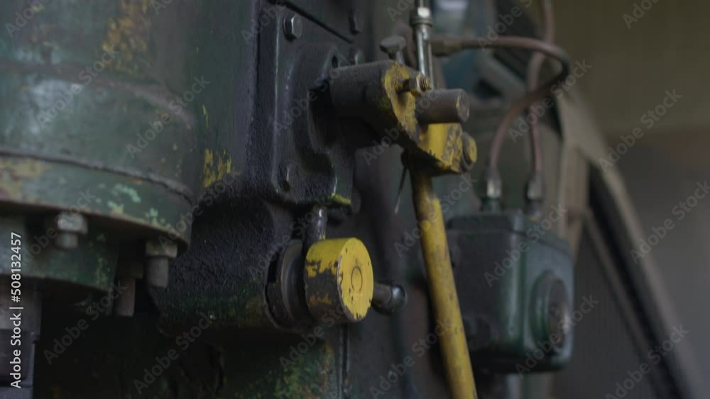 Big flywheel spinning in the industrial engine room of a cabin ski lift. High quality 4k footage Big flywheel spinning in the industrial engine room of a cabin ski lift. High quality 4k footage