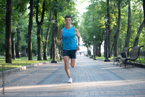athletic man runner jog in sportswear outdoor