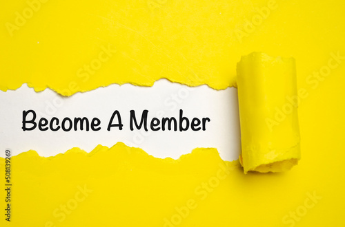 Become a member text on yellow torn paper. Concept photo