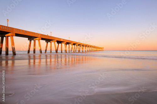 Beautiful sunset over Jennette's Pier , Nags Head North Carolina. Originally built in 1939, Jennette’s is the oldest fishing pier on the Outer Banks, NC USA