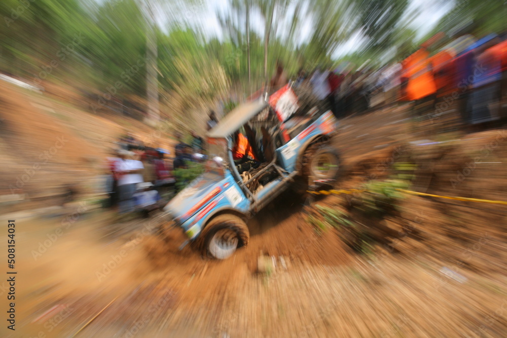 
Defocused abstract background blue offroad car going down hill