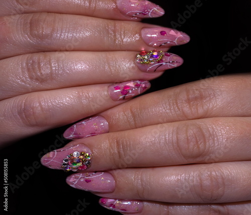Beautiful female hands with perfect manicure.Fashion design of manicure on beautiful handles