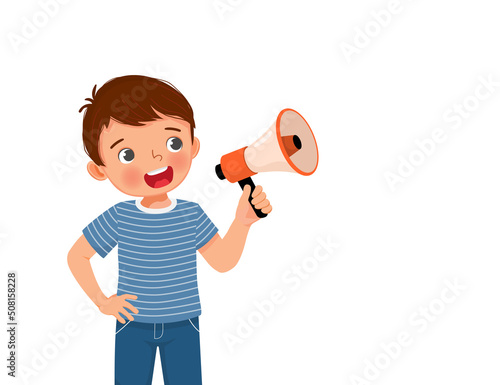 cute little boy holding megaphone speaking and shouting making announcement