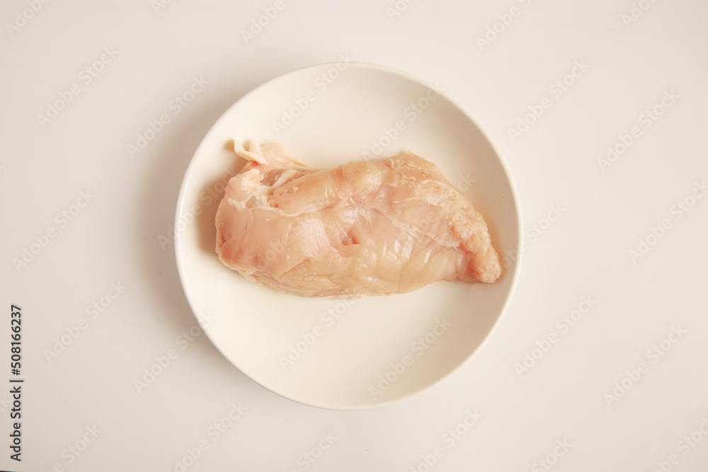 Raw chicken breast on the table Raw chicken breast on the table