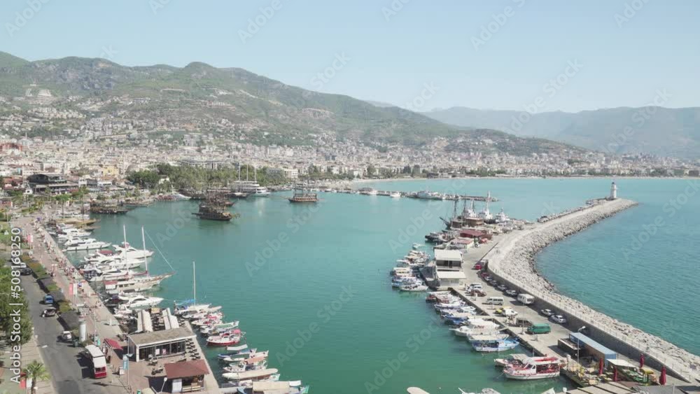 Awesome aerial view of tourist ship crossing Alanya Marina Awesome aerial view of tourist ship crossing Alanya Marina