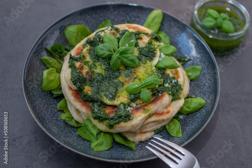 typical flatbread with wild garlic pesto photo