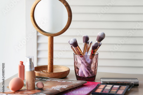 Holder with makeup brushes,...