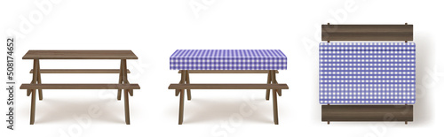 Wooden picnic table with long benches and purple white checkered tablecloth 3d realistic vector. Camping, garden or park wood furniture for barbecue with seat and textile cover, isolated on background