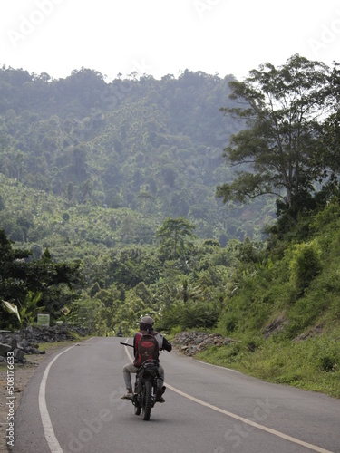 The recently built southern Indonesian highway makes it easier for tourists and local residents to access. © Zona Imaji