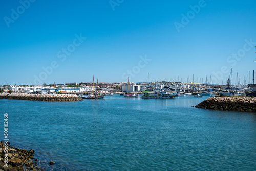 Panorama of the promenade of the tourist city of Lagos in the Algarve, Portugal in the summer of 2022. © martinscphoto