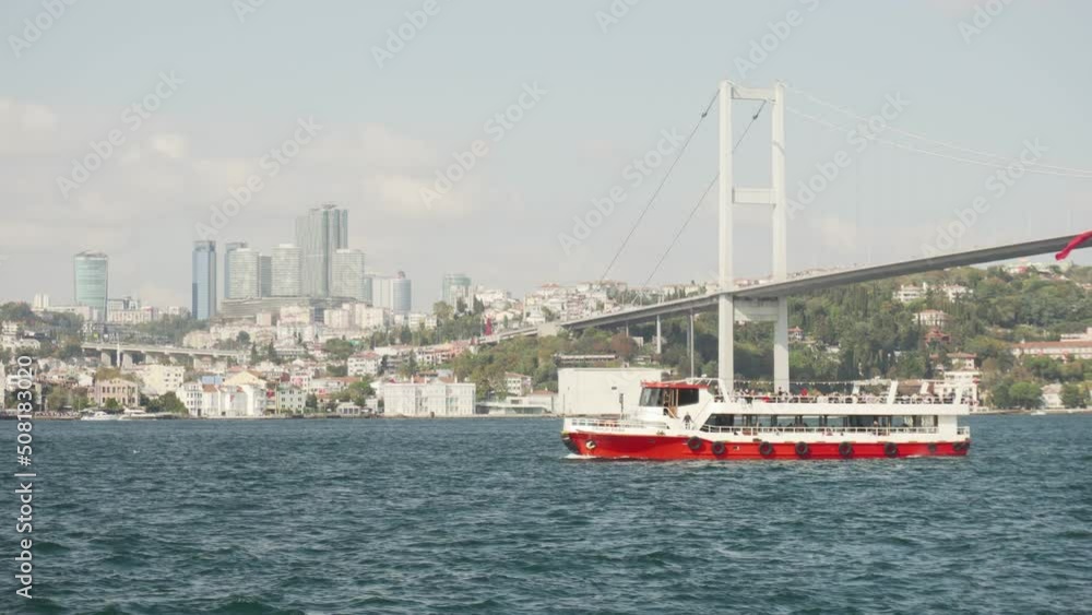 Boats are crossing the Bosporus. View of the Bosphorus Bridge Boats are crossing the Bosporus. View of the Bosphorus Bridge