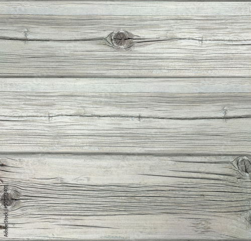 Gray textured aged wood planks with cracks. Old boards from weathered grey plan. Background