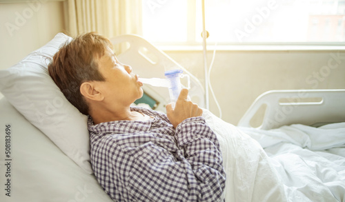 Hospital patient doing nebulization therapy