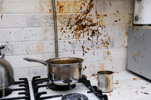 Oil stains on the walls, dirty stains on kitchen wall, Dirty Cooking. forgot to turn off the gas stove, condensed milk explosion