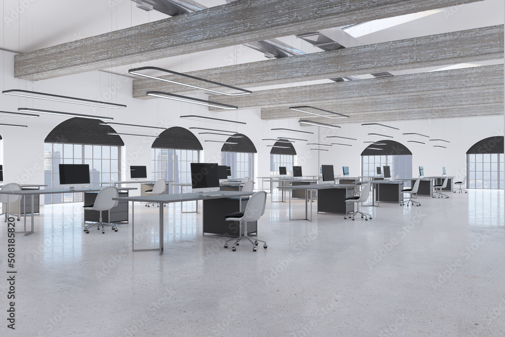 Obraz premium Modern coworking office interior with empty computer screens on desks, concrete flooring and window with city view. Workplace concept. 3D Rendering.