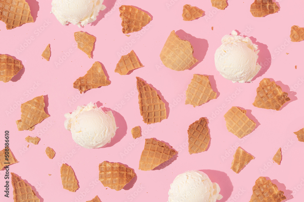 Summer creative layout with broken ice cream cone pieces and ice cream