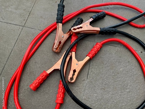 red and black car battery jumper cables photo