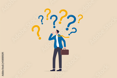 Uncertainty, confusion and decision making, choosing options or choices, answer for question or solution, problem solving, frustrated businessman thinking and make decision with many question marks. © Nuthawut