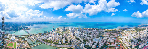 Aerial Cityscape and Bay View of Meilisha District, Haidian Island, Haikou City, Hainan Province, China.