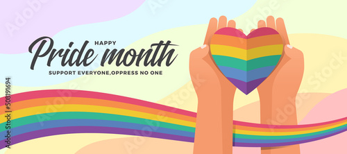 Happy pride month - hands hold paper rainbow pride heart with pride flag wave around on abstract curve colorful texture background vector design