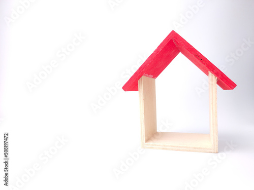 Toy house isolated on white background with copy space