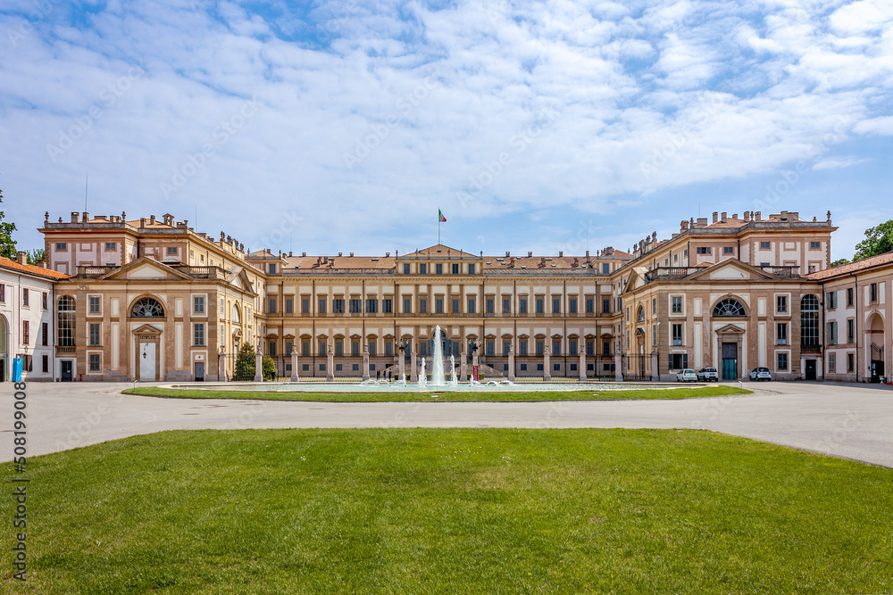 Monza (Milan, Lombardy, Italy) - Royal Palace (Villa Reale), 18th century, exterior with gardens under a clear blue sky in a spring afternoon