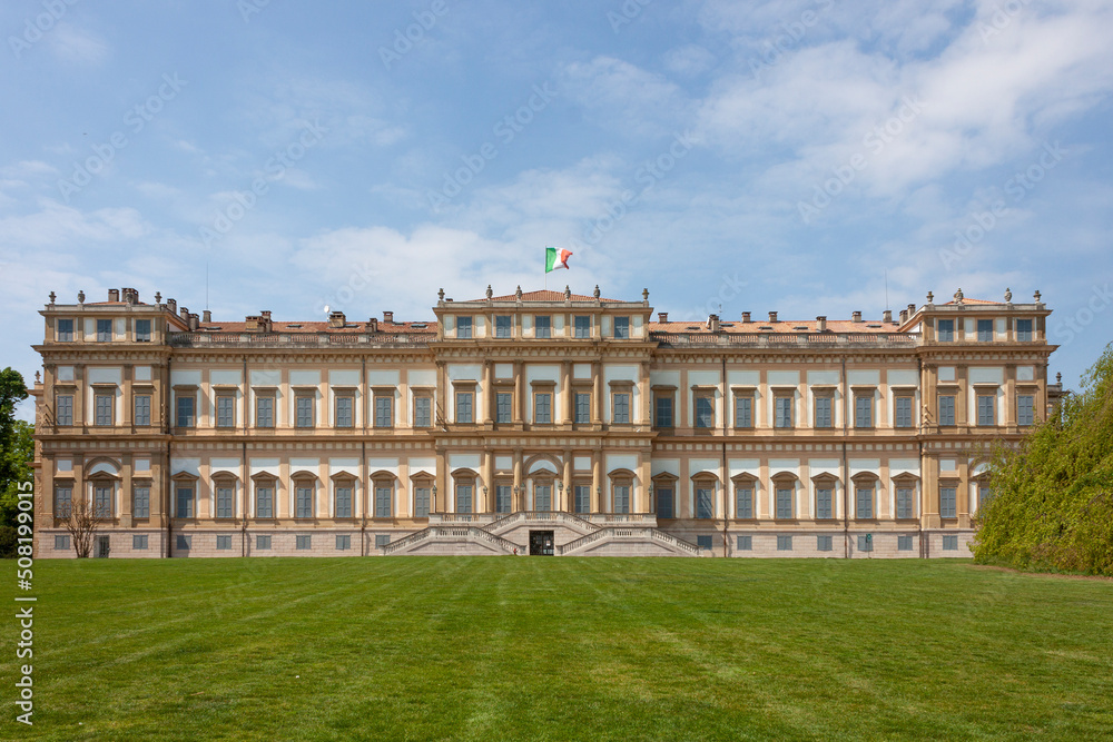 Monza (Milan, Lombardy, Italy) - Royal Palace (Villa Reale), 18th century, exterior with gardens under a clear blue sky in a spring afternoon