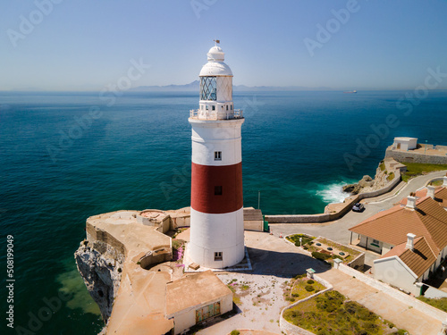 Lighthouse of Europa Point in Gibraltar overlooking the Strait with Morocco in the background.