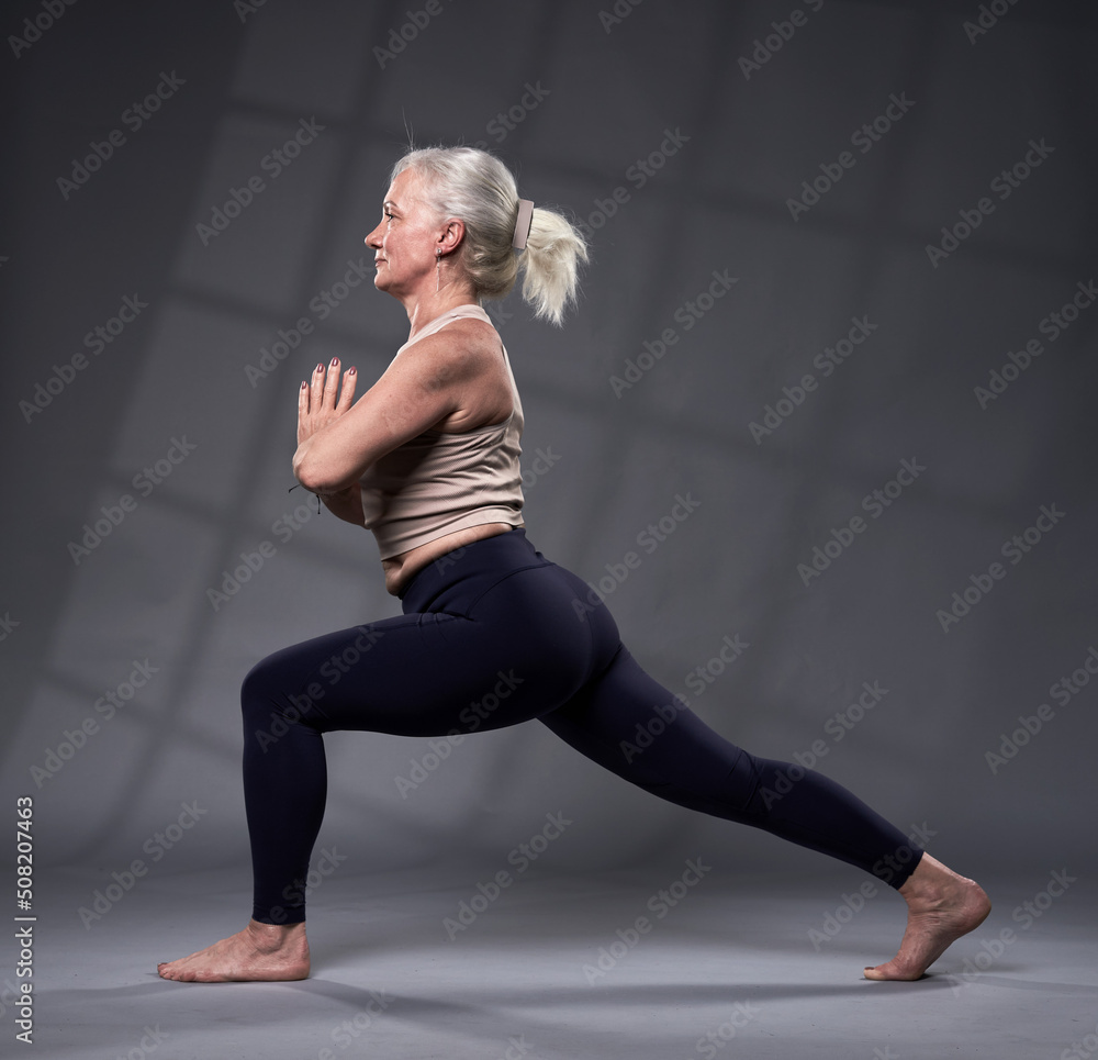 Fototapeta premium Senior woman in yoga pose
