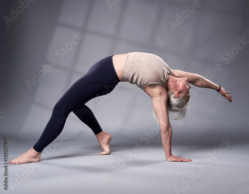 Senior woman in yoga pose