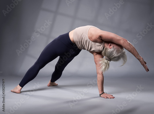 Senior woman in yoga pose