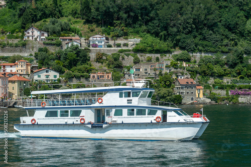 Tourist ship on Lake Maggiore in front of Cannero Riviera in northern Italy