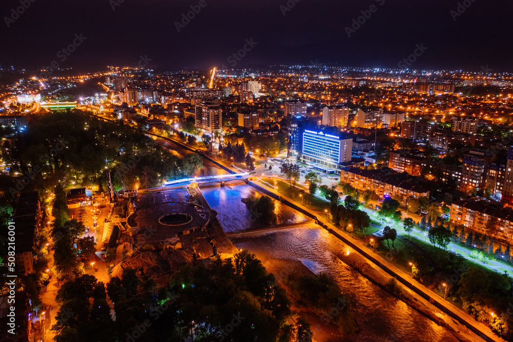 Vladikavkaz, capital of North Ossetia at night. Panorama from drone flight