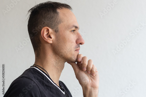 man thinks, is going through against a white background