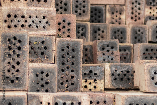burnt red brick stacked on top of each other