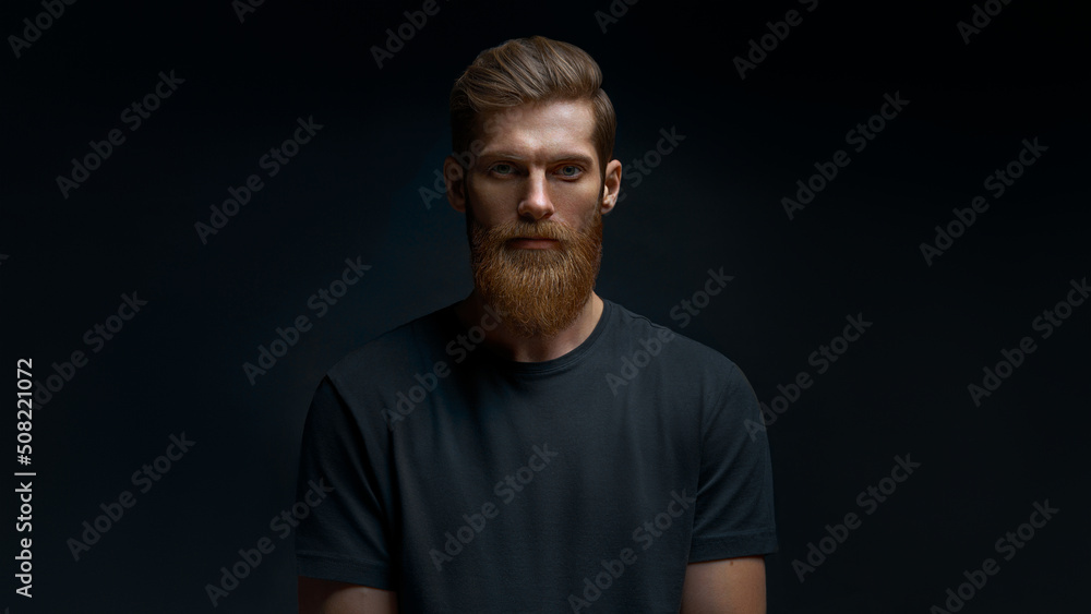 Young caucasian man. Bearded man. Handsome confident perfect hairstyle man.