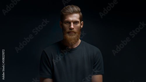 Young caucasian man. Bearded man. Handsome confident perfect hairstyle man.