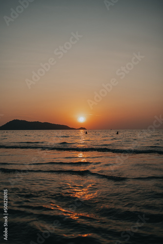 Fototapeta Naklejka Na Ścianę i Meble -  Sunset over the ocean in Phuket, Thailand