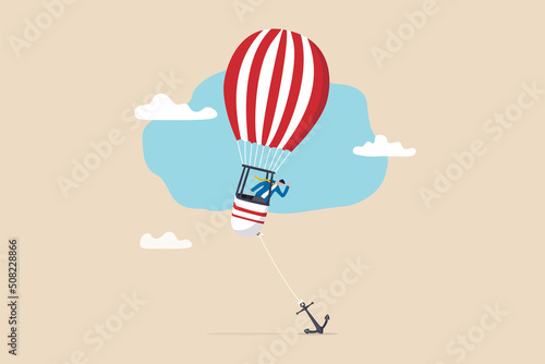 Problem or trouble to prevent business to grow up, mistake or failure, obstacle or error to make business fail, frustrated businessman look at heavy tied anchor to prevent his balloon to flying up.