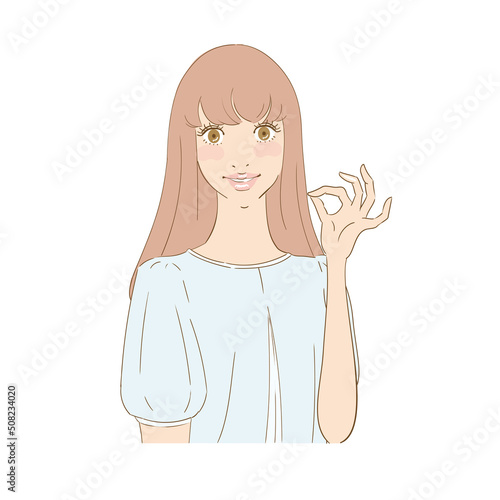 OKサインを出す笑顔の美しい女性
