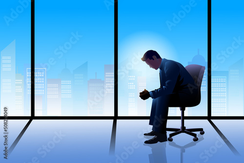 Frustrated young business man sitting on chair at modern startup office interior photo