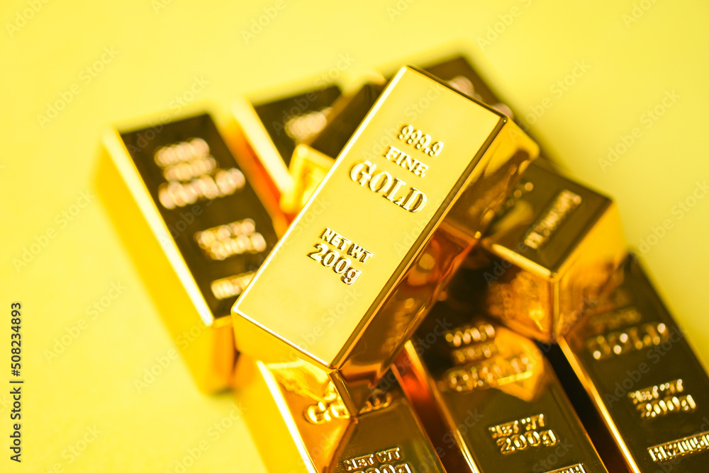 Gold bars on yellow background, gold bars financial business economy concepts, wealth and reserve success in business and finance Gold bars on yellow background, gold bars financial business economy concepts, wealth and reserve success in business and finance